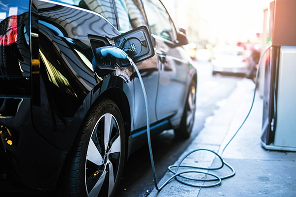 Car being charged with an EV Charging device