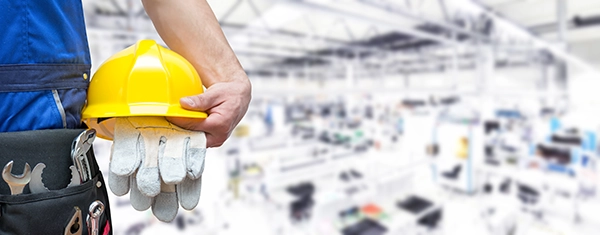 Workwear, man holding a safety helment