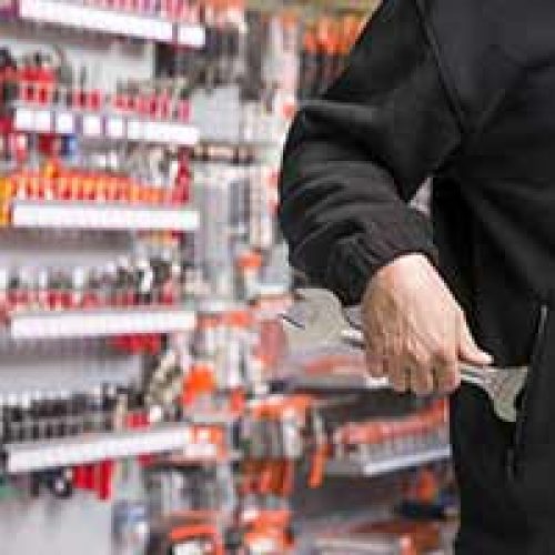 A man commiting Tool theft