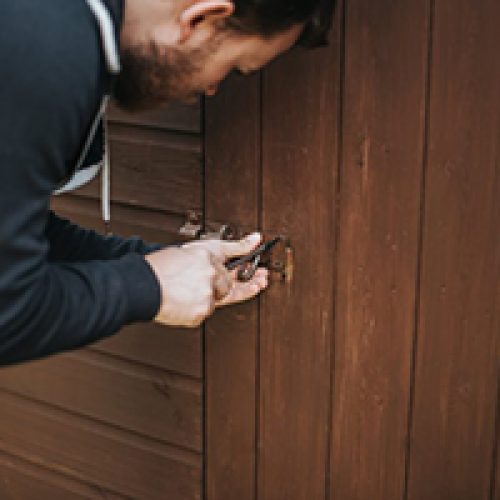 Guy locking the Tiger sheds