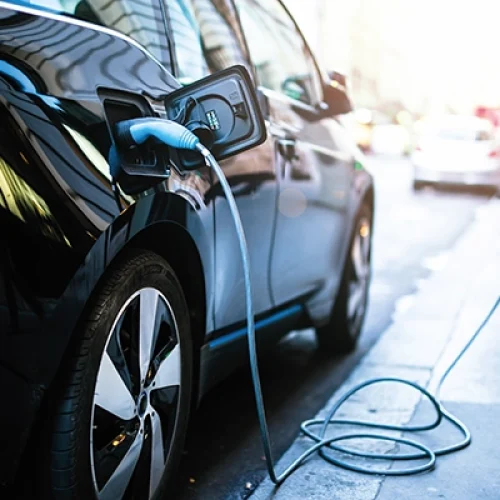 Car being charged with an EV Charging device