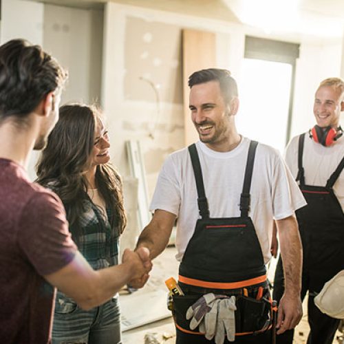 3 tradespeople with clients