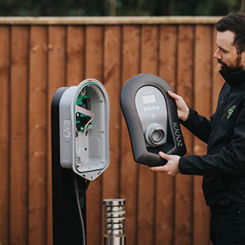engineer installing solar-supporting technology